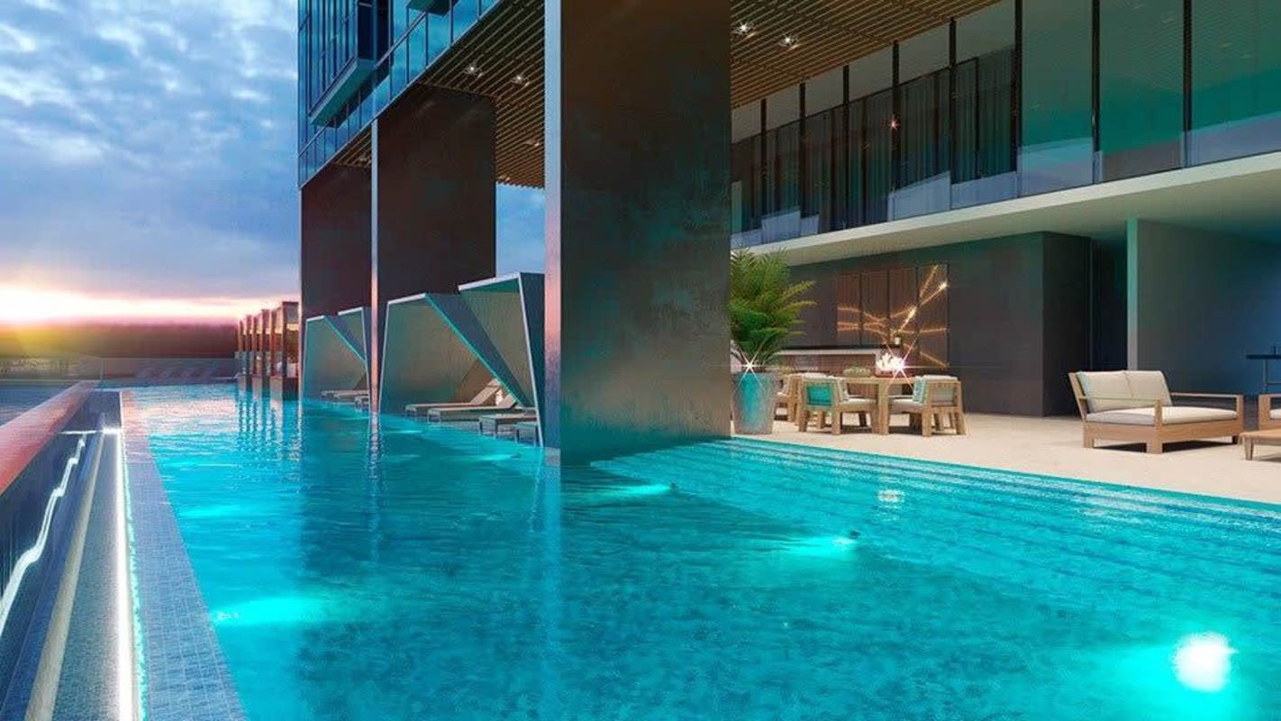 Outdoor home theater terrace with lush landscaping at Generation Tower Costa del Este Panama