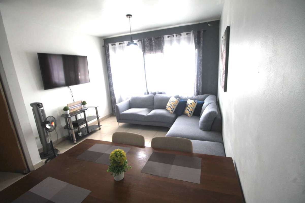 Bedroom with tile floor, window, closet space at PH El Ingenio Betania Panama