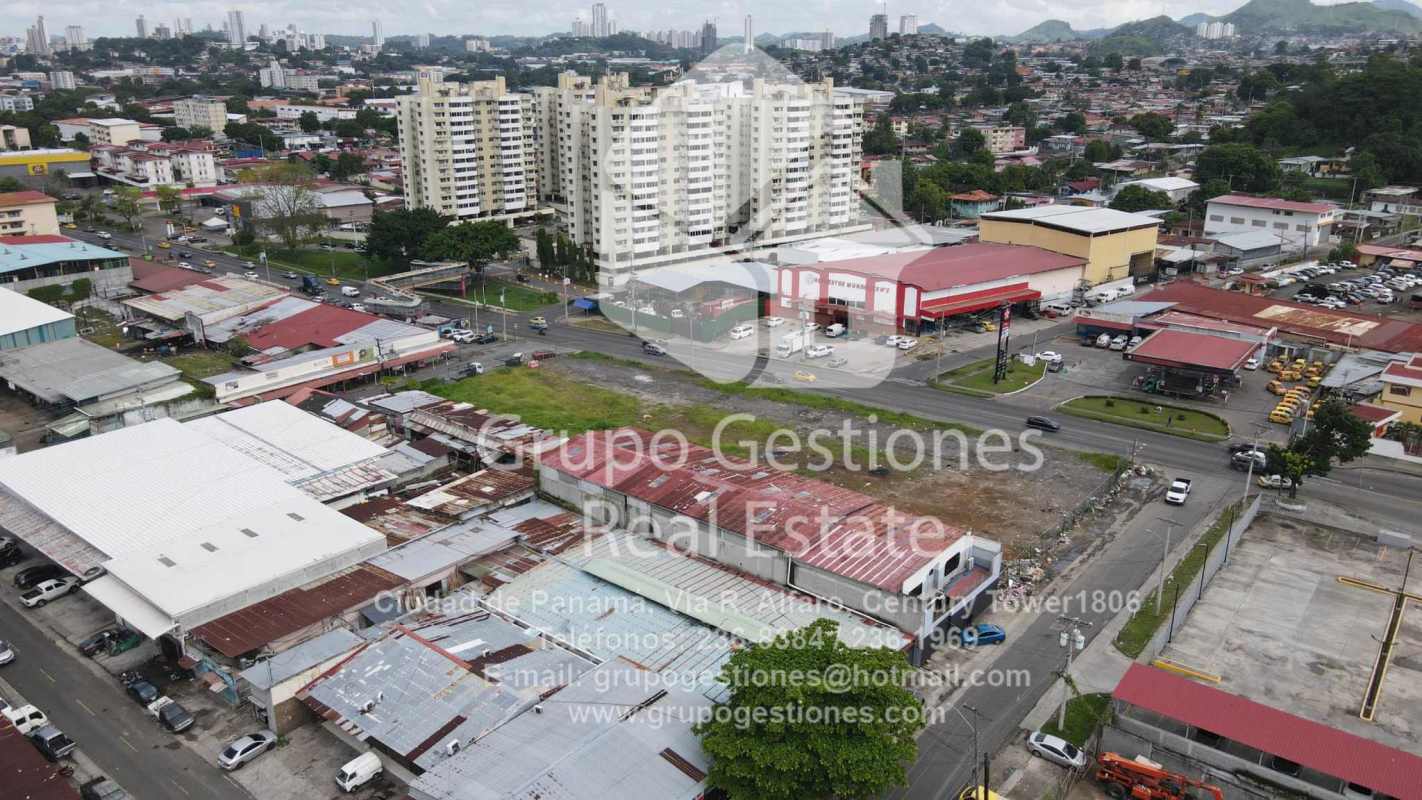 Panama City mixed-use sector with commercial buildings and high-rises around vacant land plot