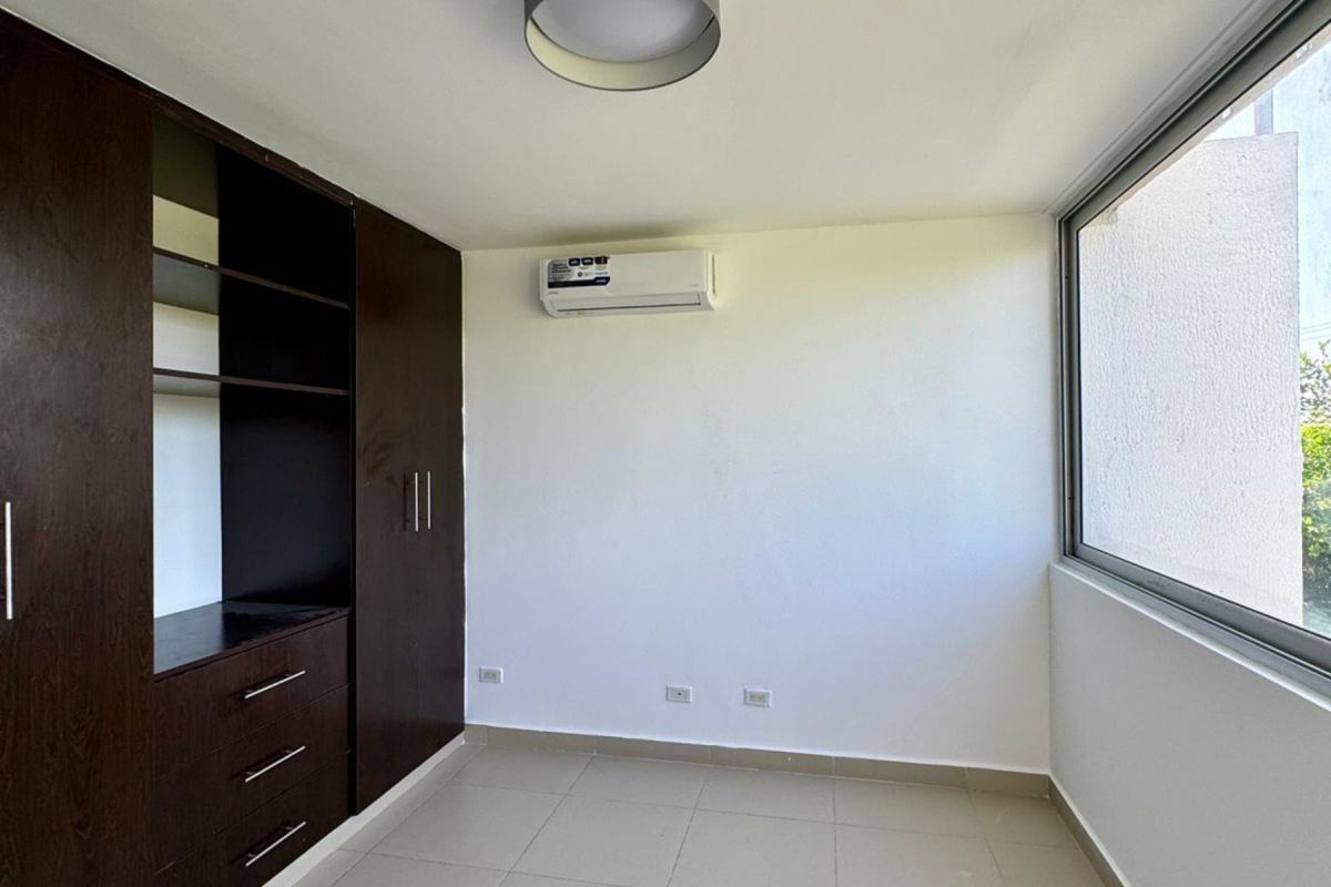 Modern kitchen with granite countertops, cabinets and cooktop in PH Village Costa Sur Panama