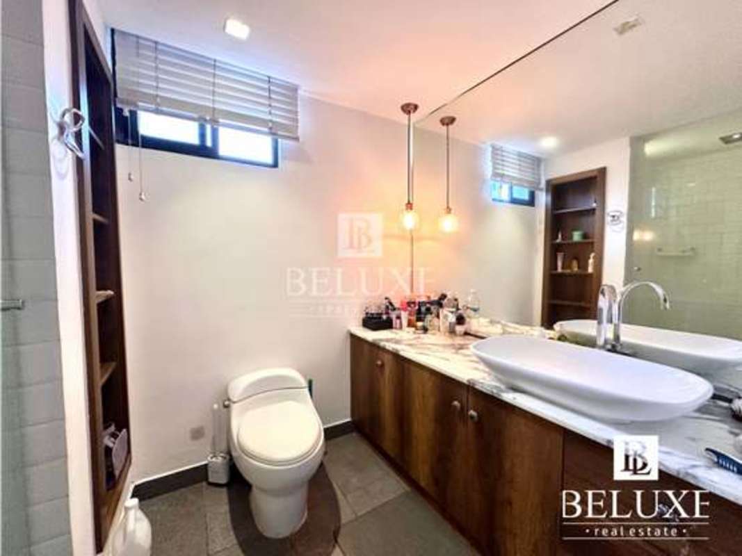 Remodeled kitchen with built-in appliances and modern finishes in PH Vista Tower Bella Vista Panama