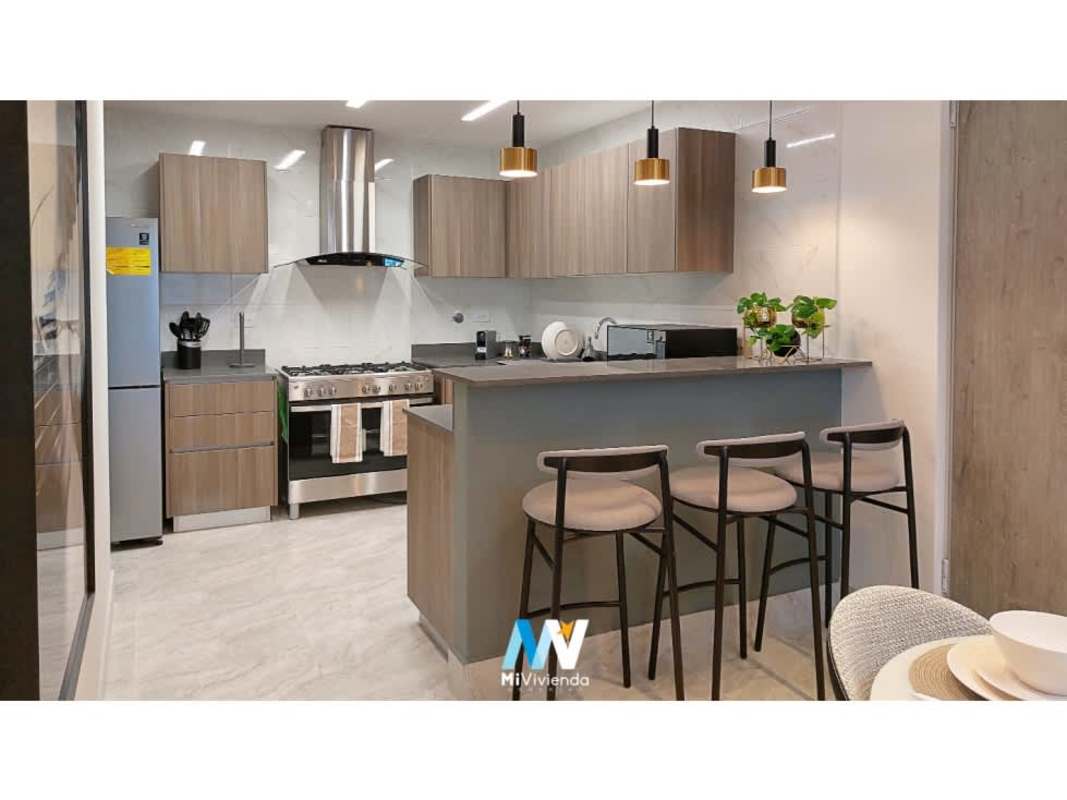 Open-concept living dining room with balcony and skyline view in PH Luxor 400 Panama City