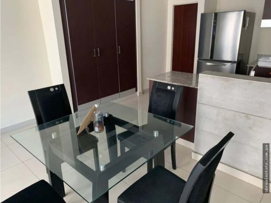 Living area with staircase, natural light and minimalist design PH Vitro Loft El Cangrejo Panama