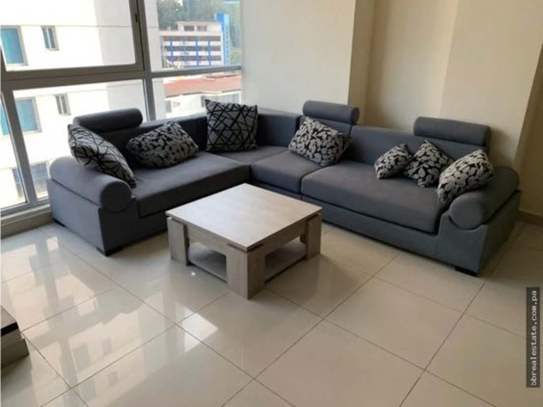 Modern living room with city skyline views, large windows PH Vitro Loft Panama
