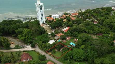 Bedroom attic-style with big windows, simple furnishings in Playa Corona beach home