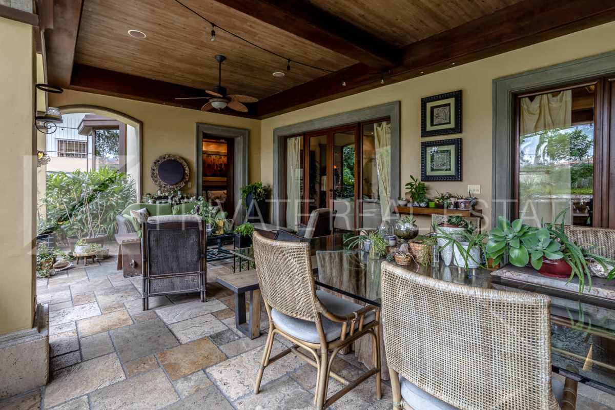 Elegant dining room marble floors chandelier luxury home Costa del Este Panama