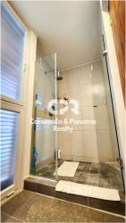 Modern bathroom with walk-in shower and ceramic tiles PH Las Islas San Carlos Panama