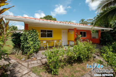 Lush gardens with swimming pool and resort grounds in Boquete Highlands hotel for sale