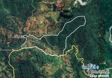 Aerial boundary outline of large Volcán Highlands property with timber trees and hills