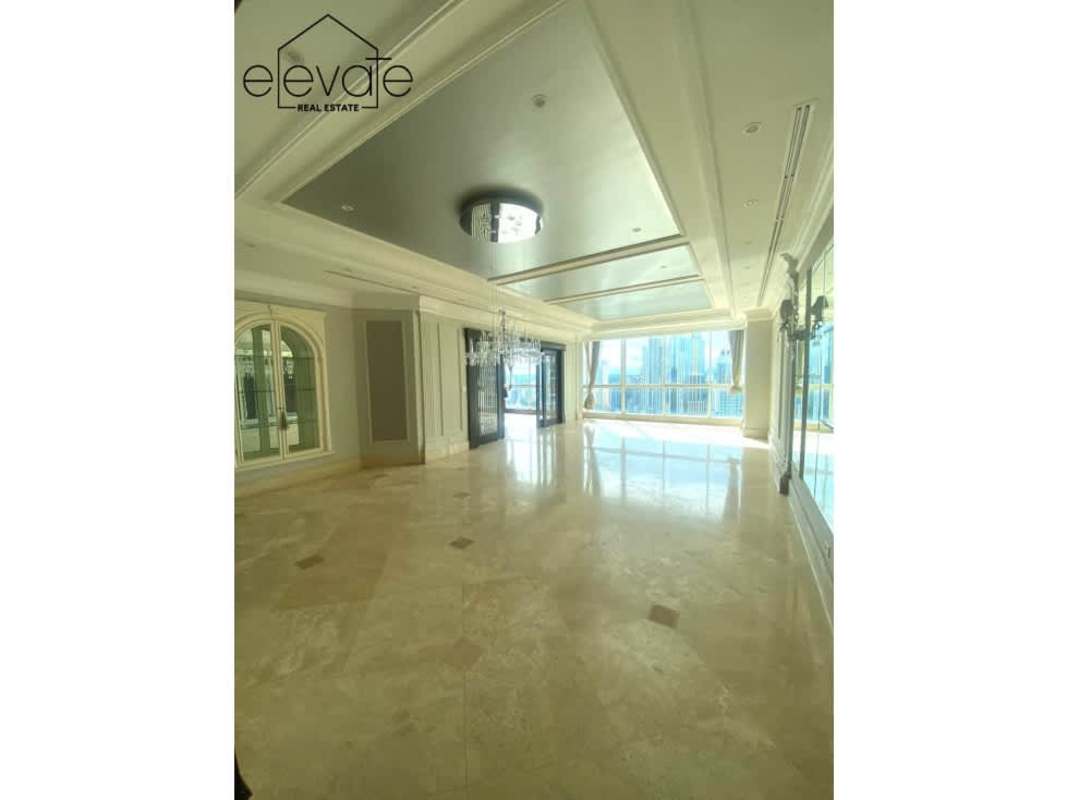 Dining room with skyline views marble floors elegant lighting in Peninsula Punta Paitilla Panama City