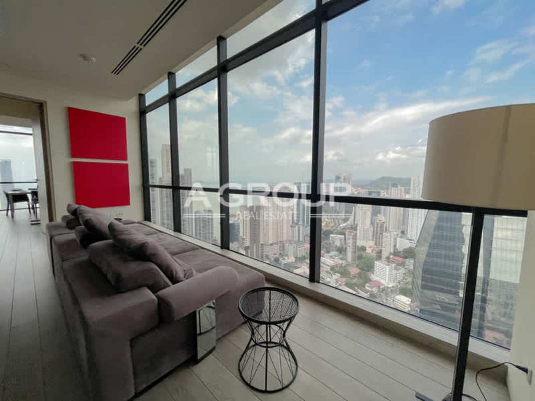 Modern office lounge with panoramic city skyline windows in PH Tower Financial Center
