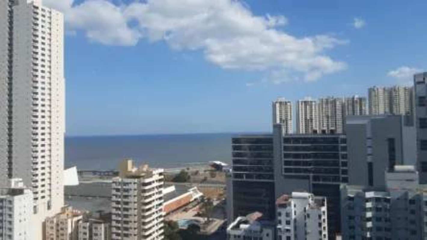 Modern high-rise buildings overlooking ocean Panama Famagosta Loft