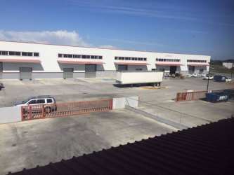 Warehouse facility with parking, loading bays trailers at David logistics park Chiriquí