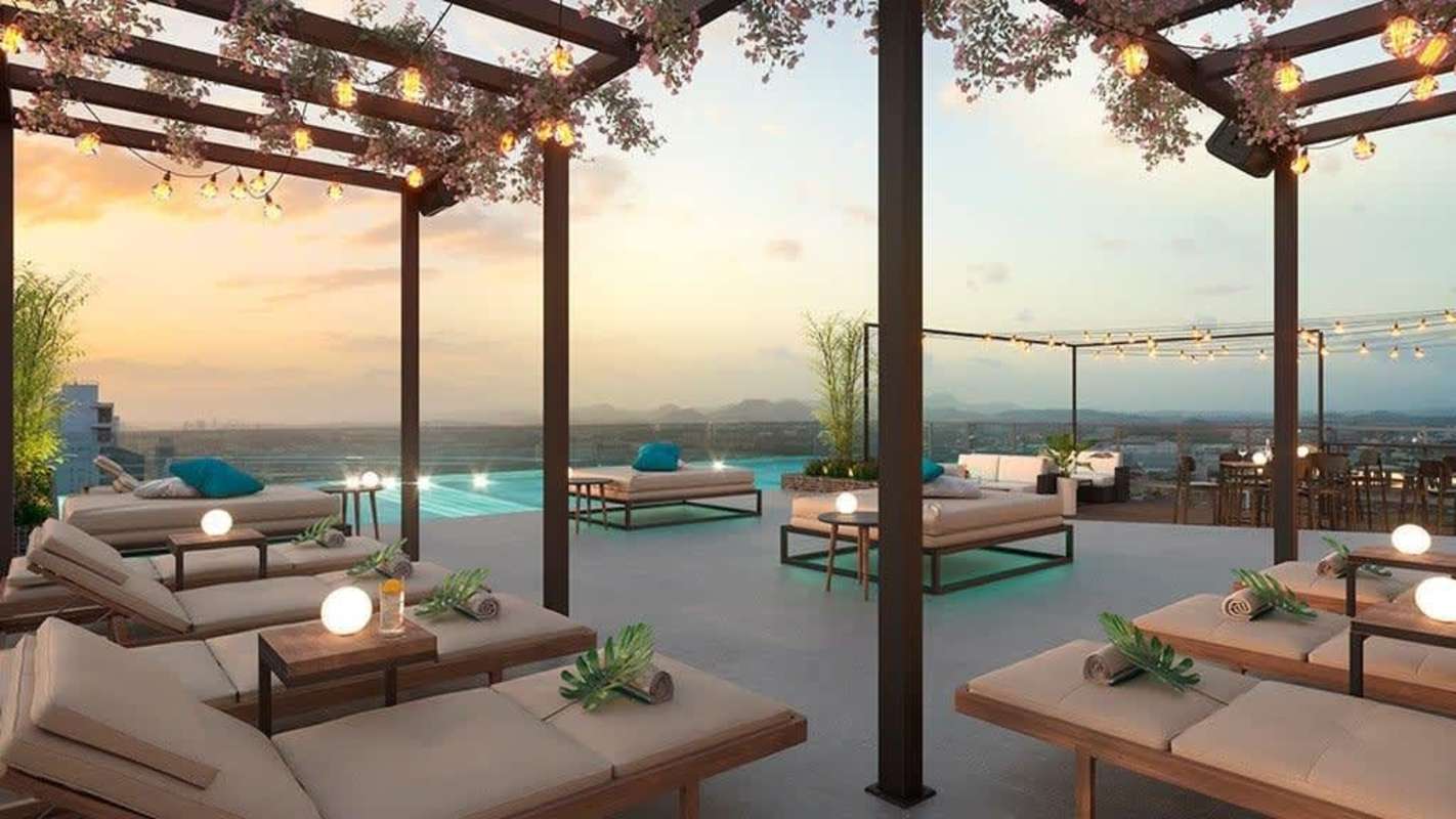 Infinity pool rooftop lounge Generation Tower Costa del Este panoramic skyline view luxury amenities