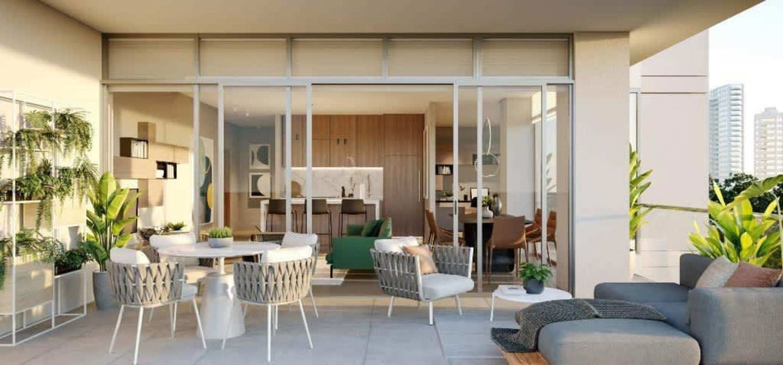 Apartment terrace with modern seating, plants, and open view connected to kitchen dining at Nogal Costa del Este