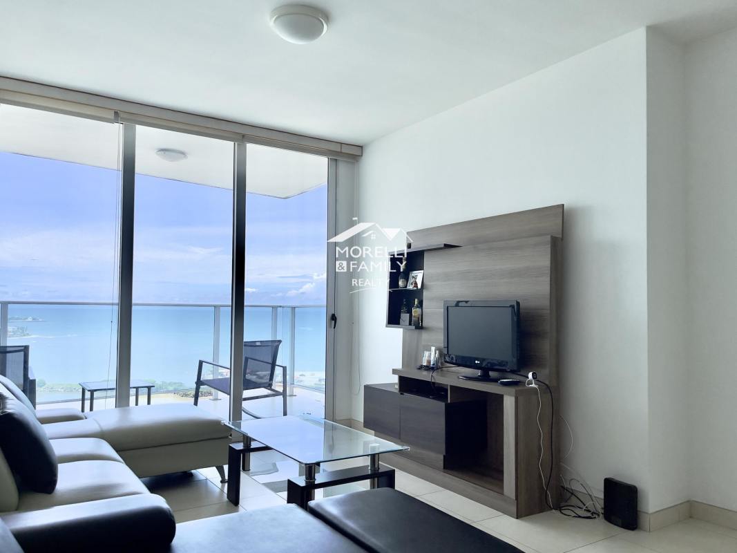 Fully equipped modern kitchen with granite counters and stainless appliances in oceanfront condo PH BICSA Financial Center Panama City