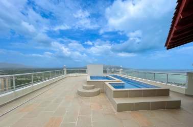 Rooftop infinity pool with panoramic ocean and golf views at Coronado Golf Tower Panama