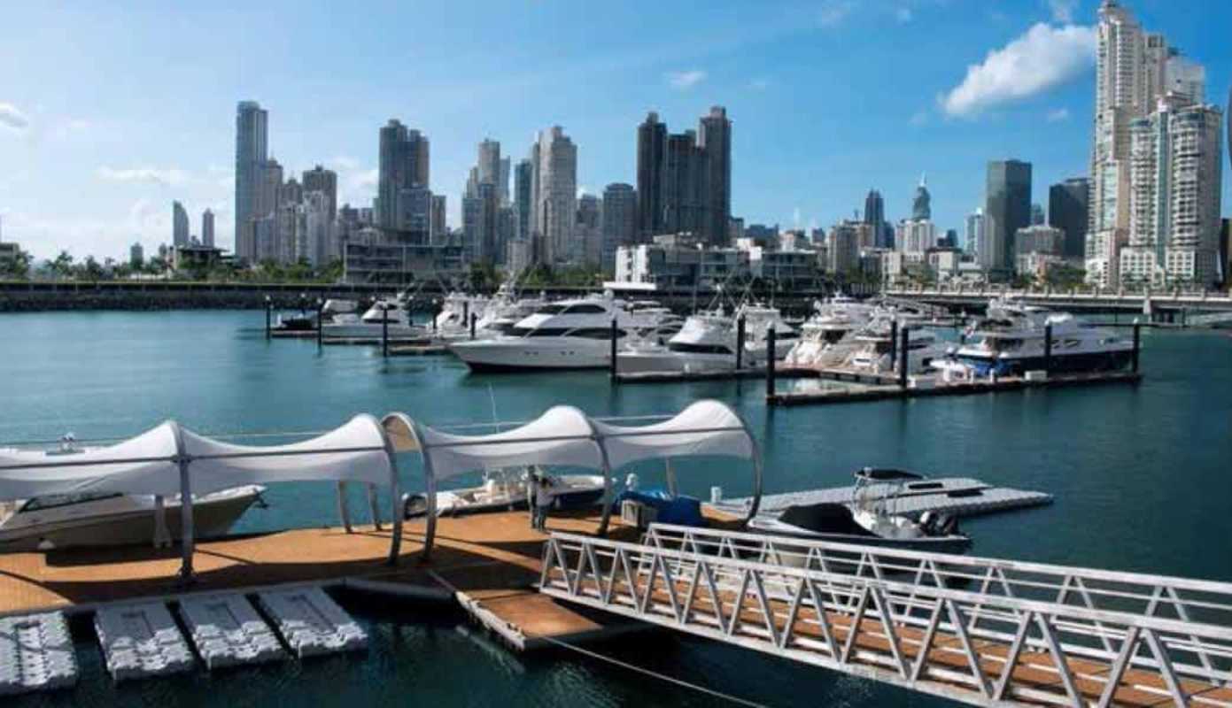 Private marina with yachts, skyline background at Ocean Reef Islands Panama City