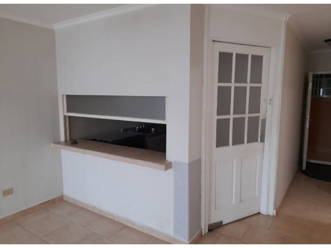 Bathroom with pedestal sink walk-in shower and tiled walls Villas de Bethania Panama apartment sale