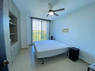 Modern kitchen with appliances tile floor and open concept Corona Beach Residences Playa Corona