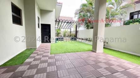 Resort style pool with lounge chairs and shaded pergolas PH Nativa Panama Pacifico