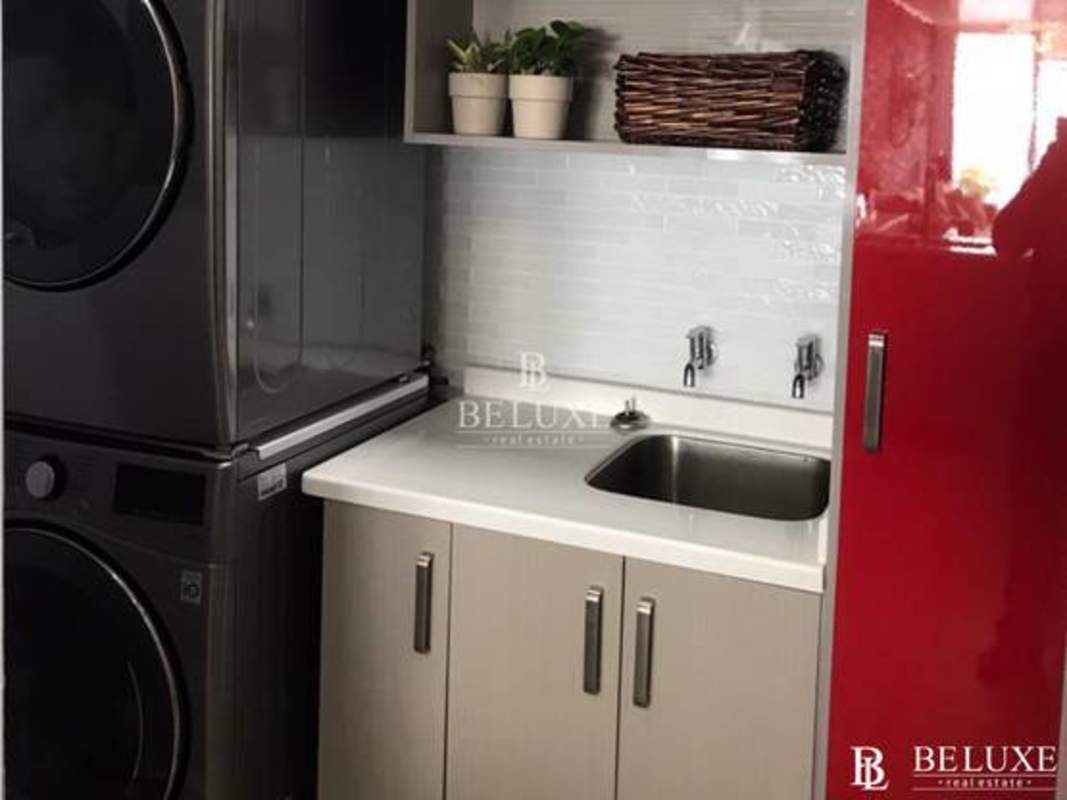 Elegant master bedroom furnished with ocean skyline Palm PH White Tower Avenida Balboa Panama