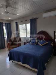 Covered rear terrace with garden view in Panama house for sale Cantarrana