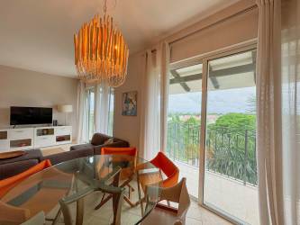 Bright bedroom with mountain and garden views and minimalist decor in Buenaventura Panama