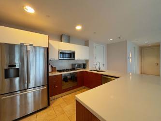 Resort swimming pool area with palm trees beachfront access in Buenaventura Panama