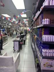 Commercial interior with shelves and tile floor in Zona Libre Colon Panama