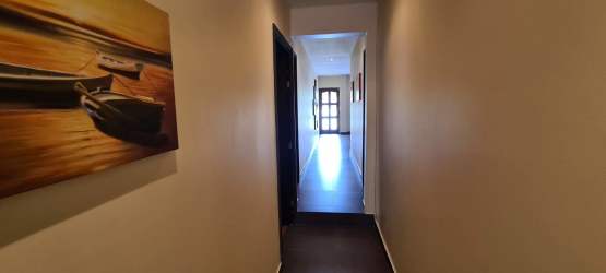 Large living area with multiple windows, natural light, ceramic floors in San Marino Ocean Front Panama