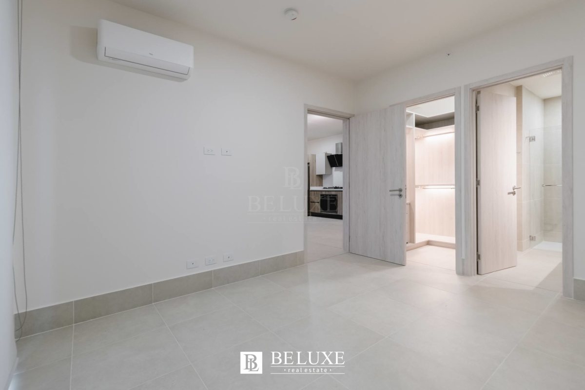 Modern bathroom marble vanity and glass shower in PH Ocean House Santa María Panama