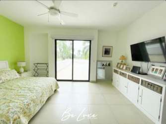 Bedroom with nautical decor and bunk beds ocean view VistaMar Islamar beach resort Panama