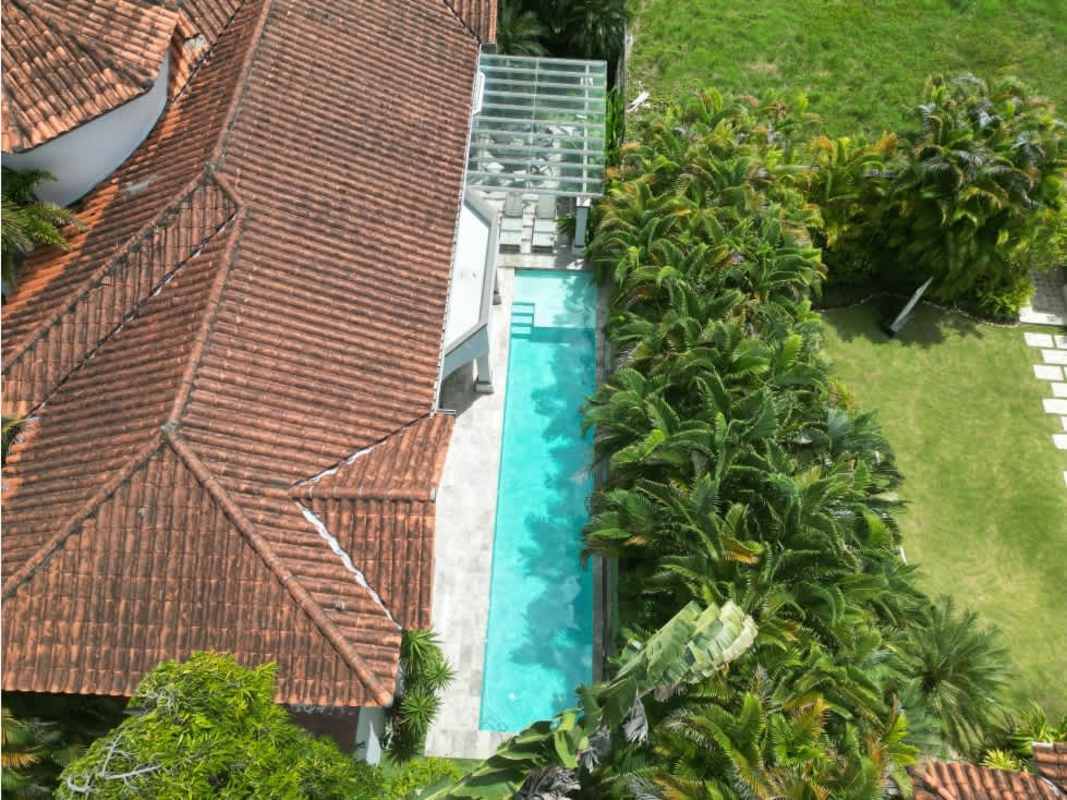Elegant Mediterranean villa aerial shot with pool and landscaped garden Costa del Este Panama City