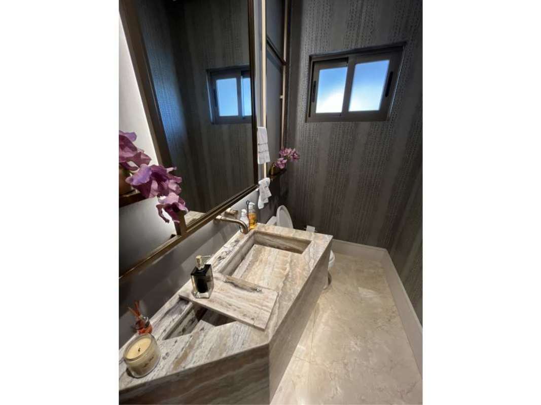 Modern bathroom with marble sink, framed mirror, designer finishes Costa del Este luxury residence Panama