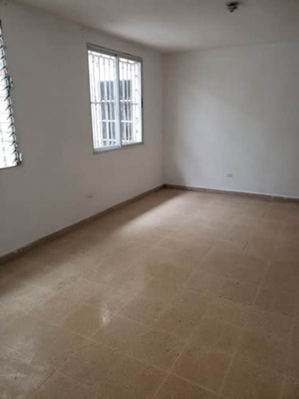 Spacious empty room bright with security windows in Villa Lucre Panama City