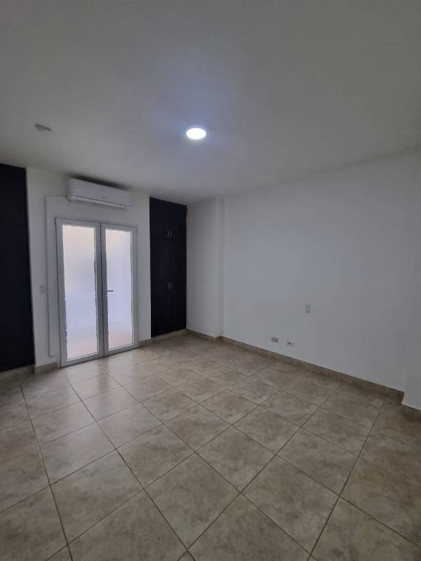 Lush landscaped grounds and Mediterranean architecture at Tucan Country Club & Resort condos