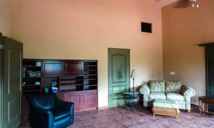 Single-level mountain house exterior with driveway, carport, garden in Altos del Maria Panama