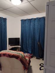 Small traditional bathroom with shower, sink and WC Jardines de Mastranto Panama