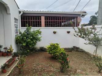 Bright living room area with large window and ceramic tile floor La Chorrera Panama