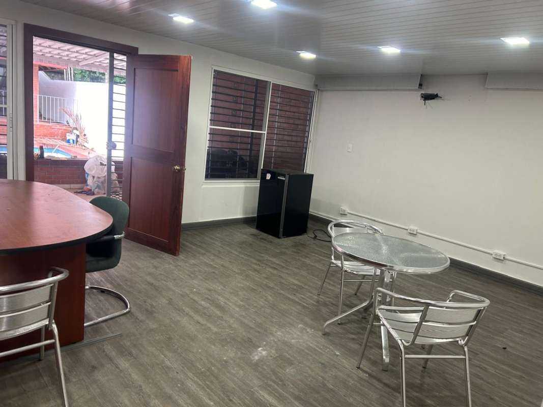 Multi-purpose conference room with glass door and chairs in Office House Coco del Mar Panama City