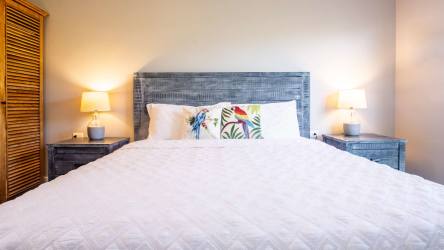 Bright bedroom with queen bed, garden views in Blue Venao luxury villa Playa Venao