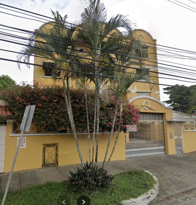 Yellow facade mid-rise PH Miraflores Plaza with landscaping Betania Panama