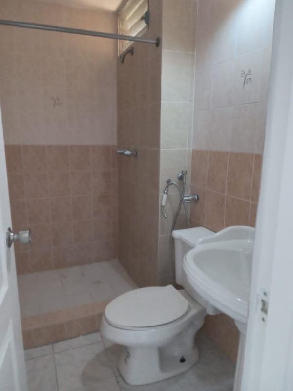 Spacious living room with sliding doors to balcony PH Miraflores Plaza Betania Panama