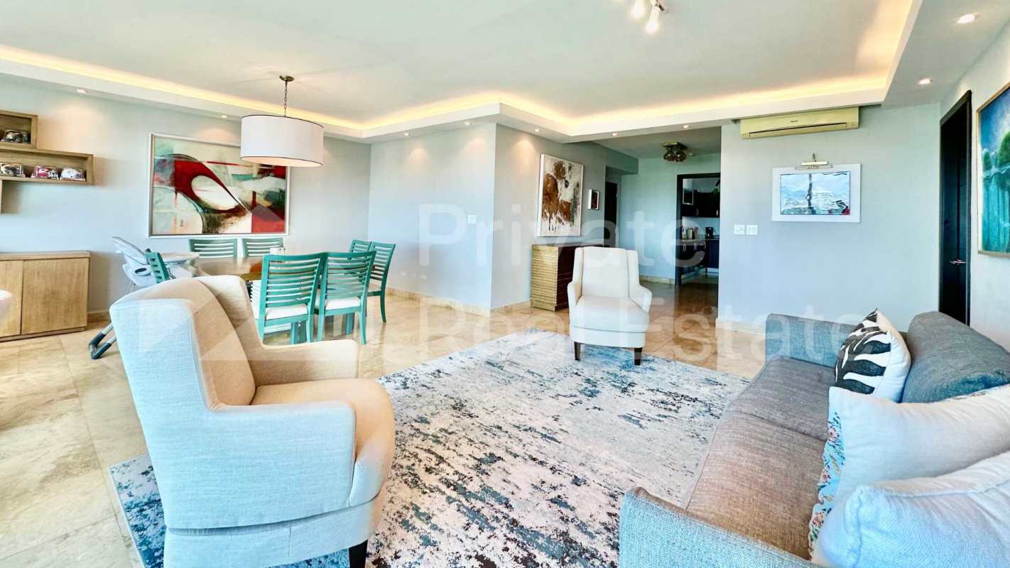 Comfortable family room or den space with natural light in PH Titanium Costa del Este