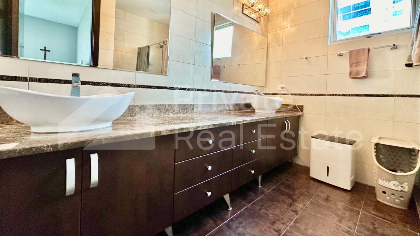 Large balcony overlooking park and ocean skyline, PH Titanium Costa del Este Panama