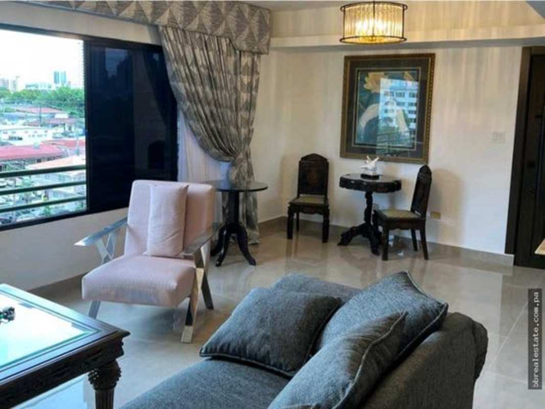 Spacious living and dining room with large windows in PH Country Park San Francisco Panama rental apartment