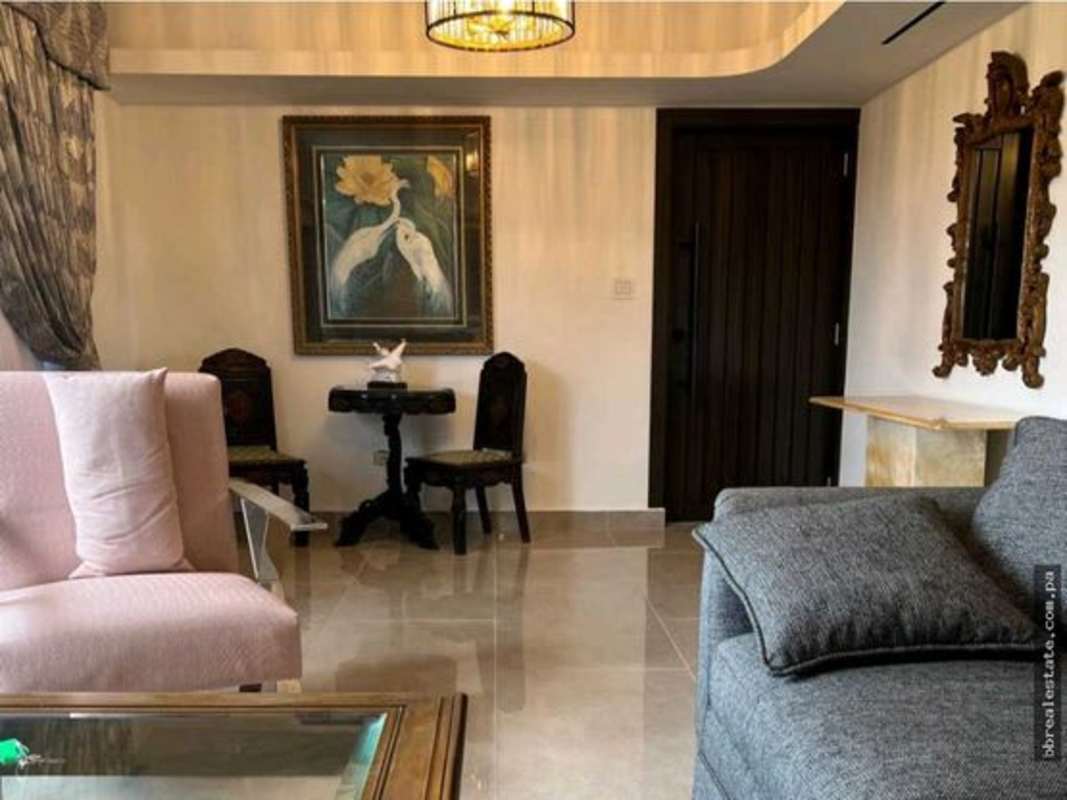 Spacious bedroom with queen bed, sofa and large window PH Country Park Panama