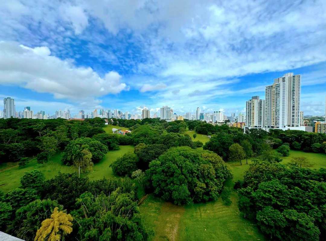 Elegant master suite with park views and walk-in closet at PH Pradera Altos del Golf