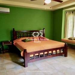 Spacious living dining area with ceiling fan in house for sale Coronado Panama